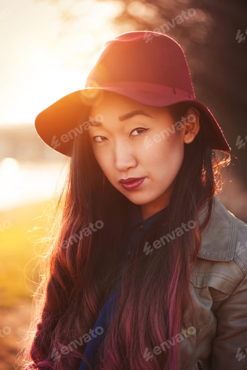 Preview: Asian Woman Outdoors At Sunny Day