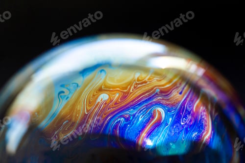 Preview: Abstract pattern, texture inside of the soap bubble, macro photography. Bubble world.