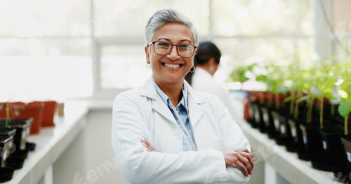 Preview: Woman, scientist and arms crossed in greenhouse for portrait with smile, pride and research for agr