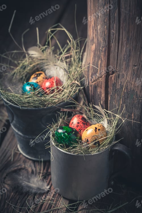 Preview: Closeup of easter eggs with hay in old metal mug