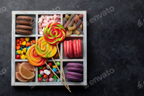 Preview: Various colorful candies, lollipops, and macaroons