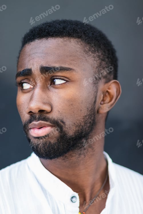 Preview: Black man in trendy clothes in city