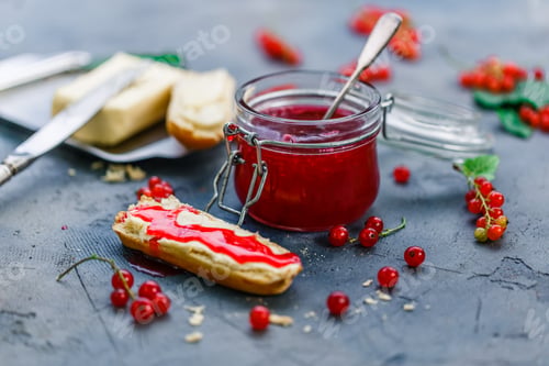 Preview: Tasty red currants jamwith brioche and butter.