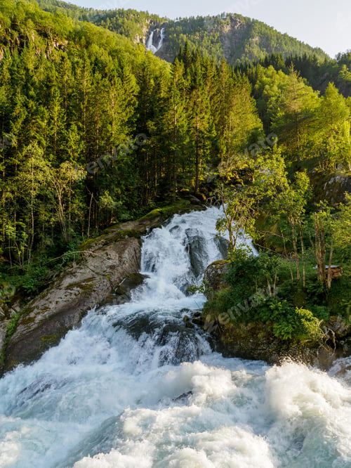 Preview: View to beautiful waterfall from Buerbreen carpark in Norway