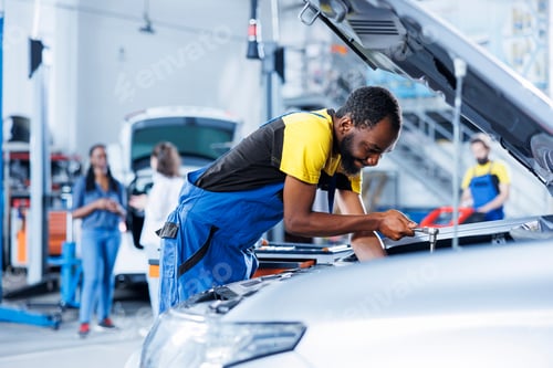 Preview: Garage engineer examines car alternator