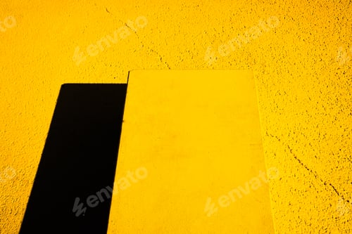 Preview: Abstract background of a floor with shapes of straight yellow and orange lines and intense black