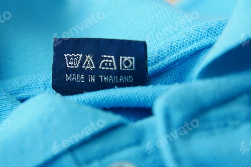 Preview: Clothing label with care symbols on a cloth
