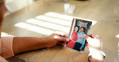 Preview: Hands, senior woman and picture at house for mourning loss, memory past and reminder of broken hear