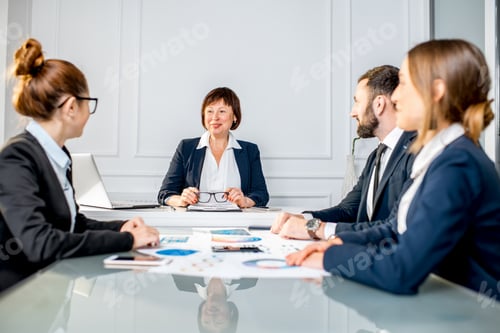 Preview: Business people during the conference in the office