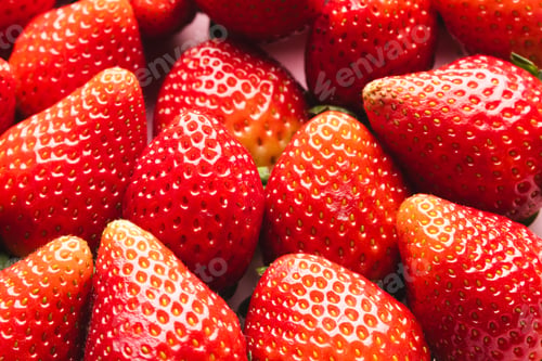 Preview: Close up of strawberries and copy space on pink background
