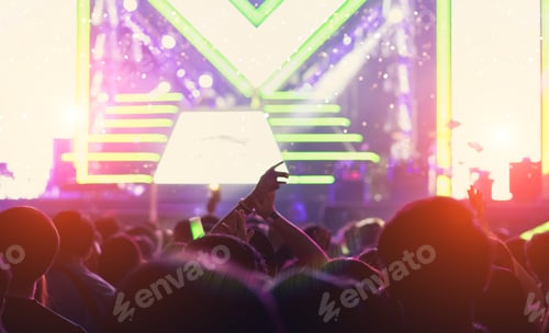 Preview: Crowd of concert stage lights and people fan audience silhouette raising hands or glow stick holding