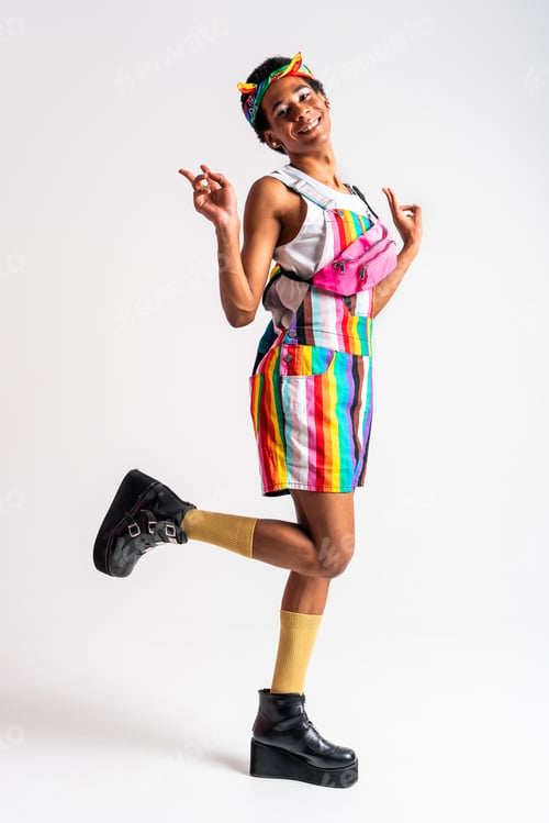 Preview: Fashionable fluid gender man posing in studio