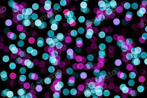 Preview: Blurred pink lights on black.
