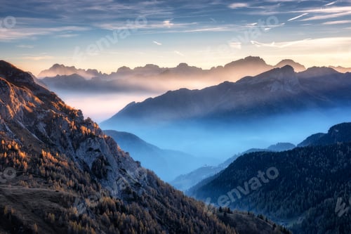 Preview: Landscape with alpine mountain valley in low clouds