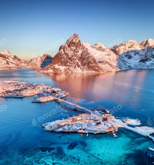 Preview: Aerial view at the Lofoten islands, Norway. Mountains and sea during sunset.