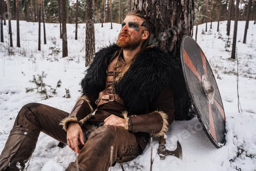 Preview: Wounded Viking Warrior Resting Against Tree