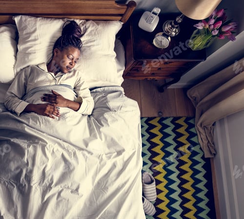 Preview: African American woman sleeping soundly