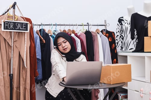 Preview: muslim woman entrepreneur receiving phone call for new sales order