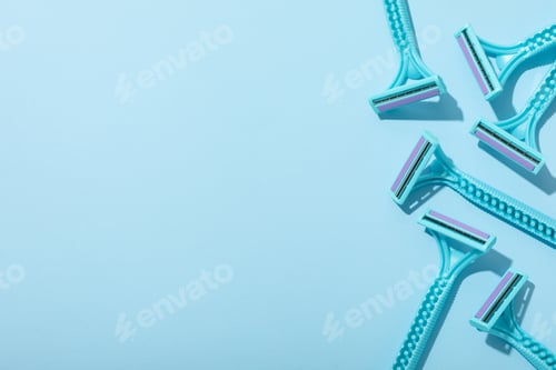 Preview: Razors for shaving on a blue background