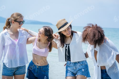 Preview: Group of friends having fun at ocean beach,Vacation on sea,Beach summer holiday sea people concept.