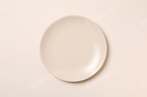 Preview: Empty plate on beige background, top view