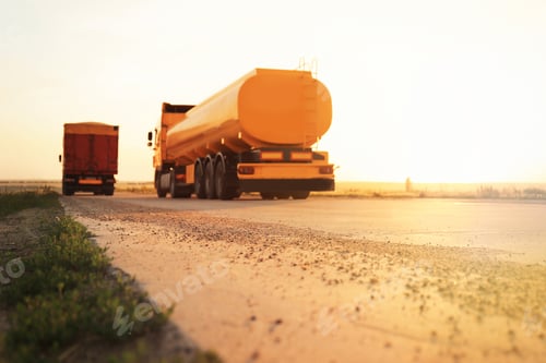 Preview: Modern trucks on country road, selective focus. Space for text