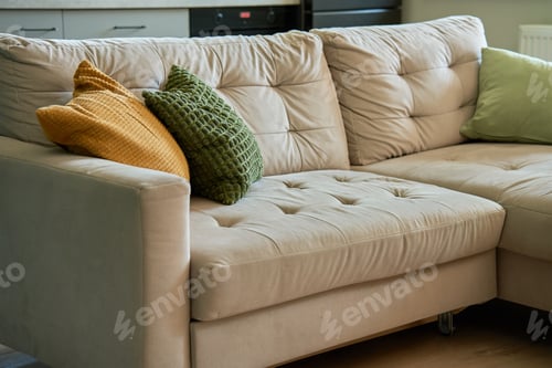 Preview: Sofa with decorative pillows in living room setting