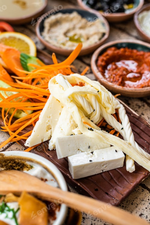 Preview: Cheese with herbs and vegetables served in Turkish Village Breakfast. Top view
