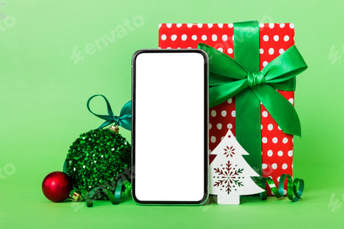 Preview: Digital phone mock up with rustic Christmas decorations for app presentation with empty space