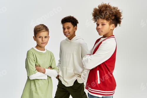 Preview: Little boys share laughter and style while showcasing their vibrant outfits and friendship