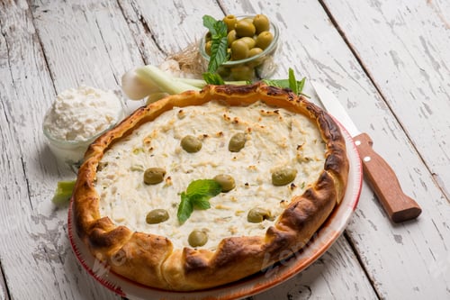Preview: salted cake with ricotta green olives and mint