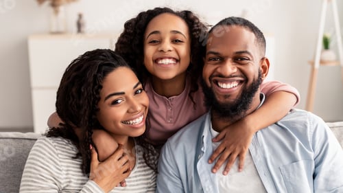 Preview: Happy Family Smiling Together at Home