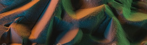 Preview: panoramic shot of textured sand with orange, green and blue lights