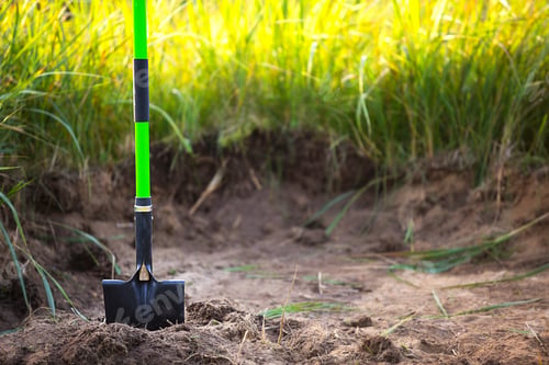 Preview: Shovel is inserted into the ground for planting in the spring. Springtime, garden plants, working on