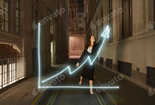 Preview: Businesswoman light painting glowing chart with upward arrow symbol on city street at night