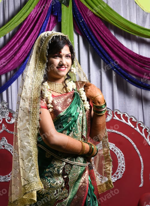Preview: Indian bride wearing traditional wedding cloths in marriage ceremony.