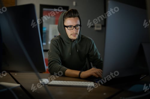 Preview: Male internet hacker in hood and glasses
