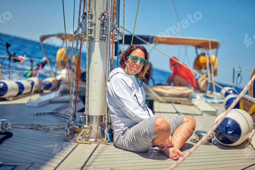 Preview: Young Woman Enjoying On A Sailing Boat.