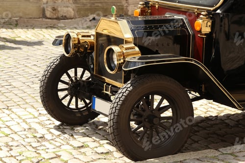 Preview: Closeup of a beautiful vintage car on the street of a city