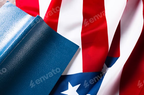 Preview: Bible laying on top of an american flag