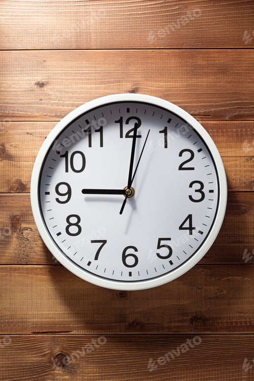 Preview: wall clock at wooden background