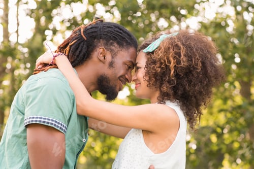 Preview: Cute couple in the park on a sunny day