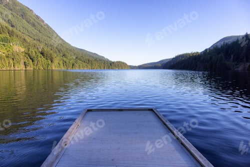 Preview: View of Buntzen Lake surrounded by Canadian Mountain Landscape