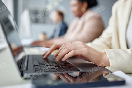 Preview: Businesswoman Typing on Laptop Keyboard