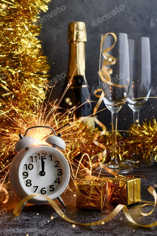 Preview: Champagne and New Year’s decorations on a counter