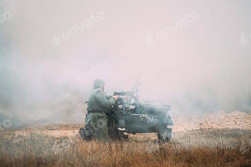 Preview: Re-enactor Dressed As World War II German Soldier Open Fire Near Motorcycle. Historical Reenactment