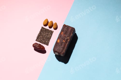 Preview: Protein date fruit candy bars fitness with nuts and fruit almond and chia poppy seeds top view on