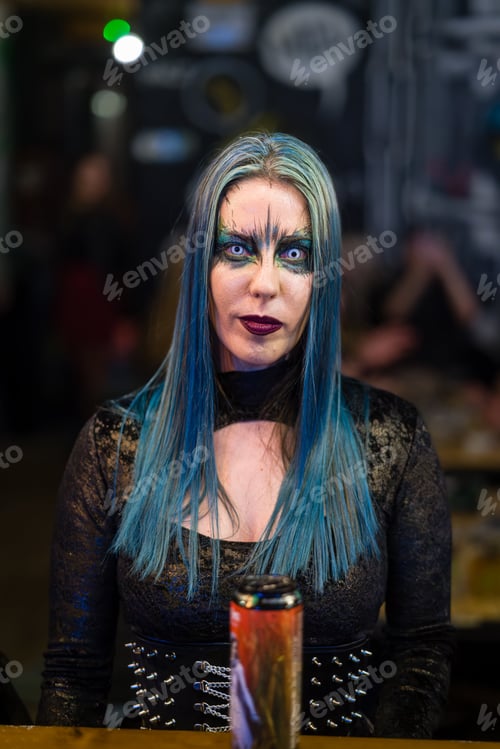 Preview: Portrait of a hot woman in a gothic costume posing outdoors at night