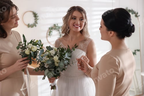 Preview: Happy bride and her bridesmaids with beautiful bouquets at home