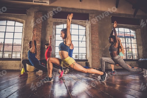 Preview: Athletes training in a gym